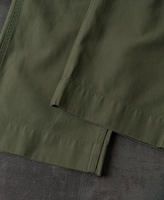 Olive fatigue pants with stitched hem and gathered cuff detail