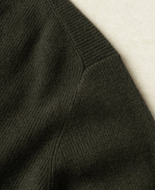 Olive knit cardigan side seam detail with ribbed texture