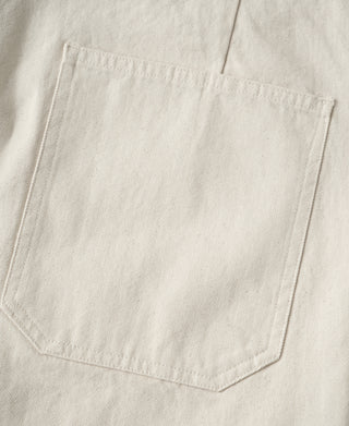 White pants front pocket with welt stitching and clean curved pocket opening