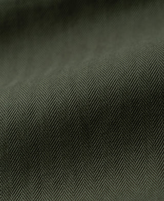 Olive herringbone weave fabric panel texture, no hardware visible.