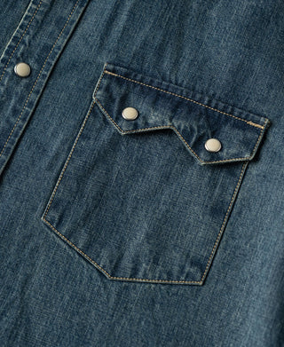 Washed denim chest flap pocket with snap buttons and contrast-stitched pocket edge