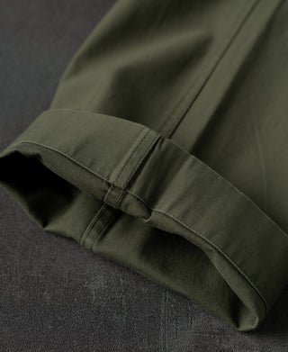 Olive ankle cuff with elastic waistband-style gather and seam stitching