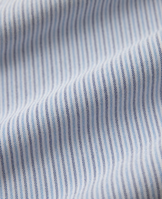 Blue striped oxford cloth fabric close-up, textured weave