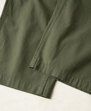 Olive cargo pants hem close-up with straight cuff and seam detailing
