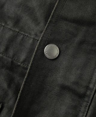Black olive field jacket pocket with round metal snap button