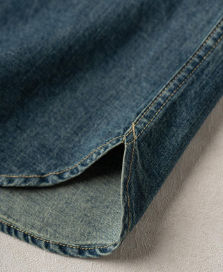 Washed denim shirt hem with double-needle topstitching and clean edge finish