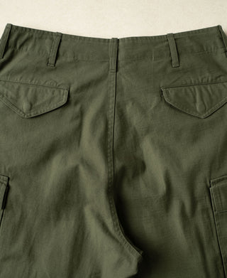 Olive cargo pants back view with two side pockets and center seam