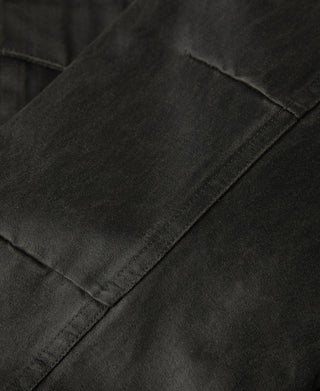 Black olive field jacket front panel with visible stitched seams