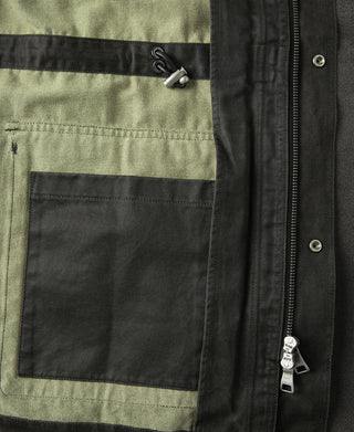 Black olive field jacket interior lining pocket with zipper and metal grommet
