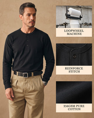 Black long-sleeve cotton henley shirt with button placket and crew neckline