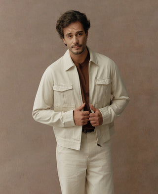 Natural twill jacket close view of flap chest pockets and front zipper