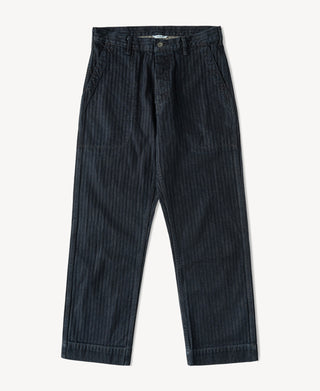Indigo herringbone denim work pants with button fly and belt loops, straight legs