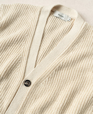 Cotton rib cardigan neckline with V-neck trim and dark button closure