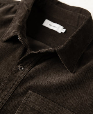 Brown corduroy work shirt neckline with buttons and inner label