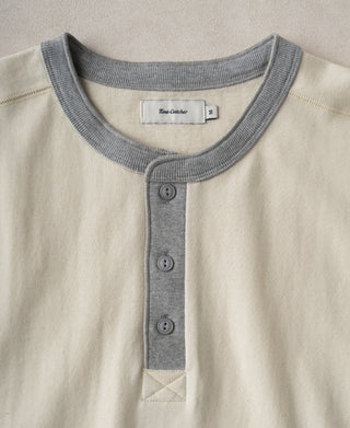 Heavyweight cotton henley shirt with gray ribbed collar and three-button placket