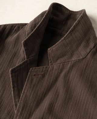 Brown herringbone blazer collar and chest pocket with flap stitching