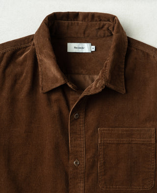 Brown corduroy work shirt with pointed collar, button placket, chest pocket