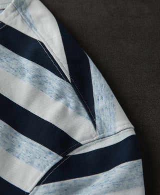 Navy-and-light-blue striped long-sleeve T-shirt sleeve detail with stitched seam