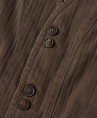 Brown herringbone waistcoat close-up of dark button details on front placket