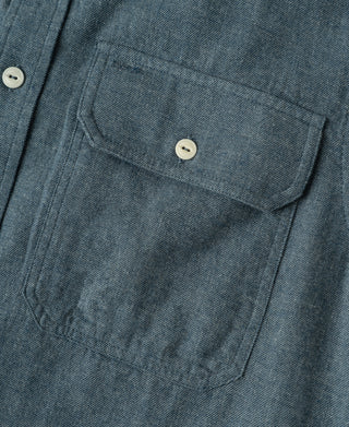 Royal blue flannel work shirt chest pocket with stitched edges and round button
