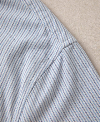 Light blue striped oxford shirt fabric with stitched collar seam detail