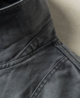 Gray-blue canvas jacket yoke seam and waistband stitching