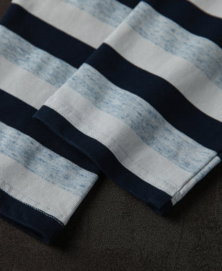 Navy-and-light-blue striped long-sleeve T-shirt sleeve and cuff detail