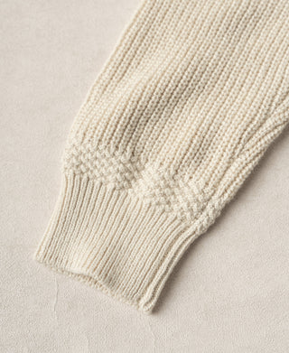 Cotton sweater sleeve with ribbed cuff and textured knit transition