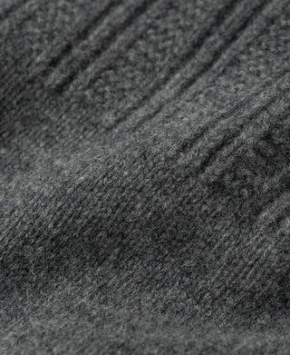 Gray wool sweater showing the transition from ribbed chest knit to plain knit