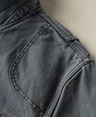 Gray-blue canvas jacket with pocket flap seam and top-stitching