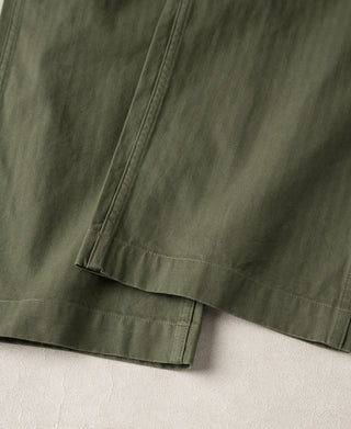 Olive deck pants back view with stitched hem and straight leg seams.