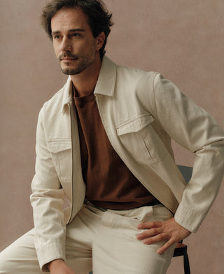 Natural twill Eisenhower jacket close view of collar, chest pockets and sleeve
