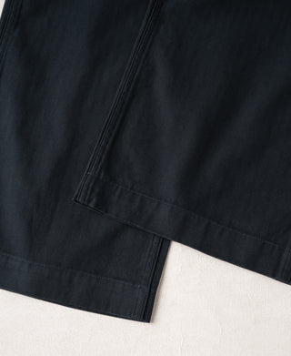 Navy deck pants hem with cuff stitching and side seam detail