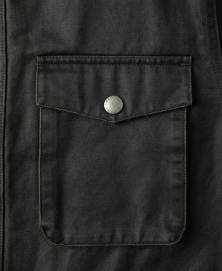 Field jacket chest pocket with button flap and reinforced stitching