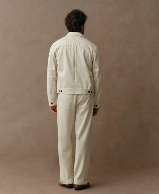 Natural twill Eisenhower jacket, back view with adjustable hem tabs and buttoned cuffs