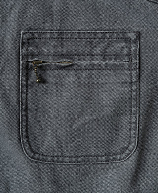 Gray-blue canvas chest pocket with zipper and stitched border