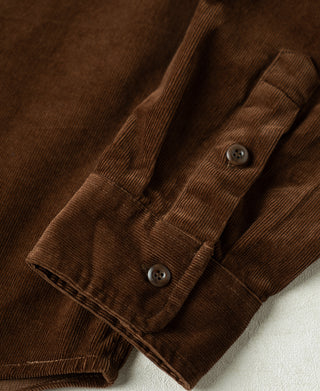 Brown corduroy shirt cuffs with two button closures and reinforced hem