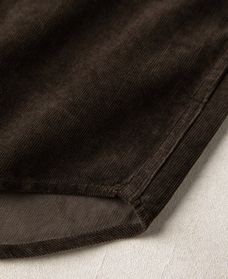 Brown corduroy work shirt hem with side seam and stitched cuff edge