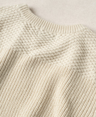 Cotton sweater neckline and upper back with seed-stitch shoulder panel