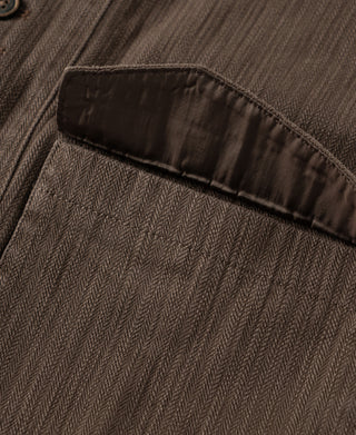 Brown herringbone waistcoat back pocket panel with stitched edge