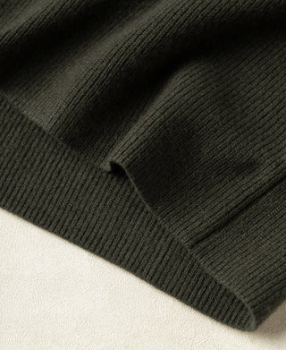 Olive knit cardigan ribbed cuff and hem, with textured knit visible