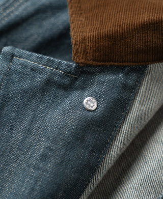 Sage blue denim barn jacket with front snap and dark corduroy cuff trim