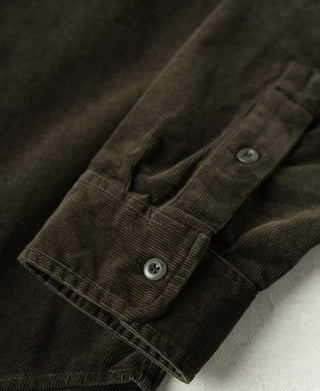 Dark green corduroy buttoned sleeve placket with two buttons