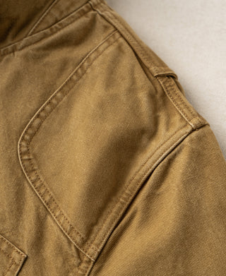 Canvas jacket shoulder with layered stitched panel detail