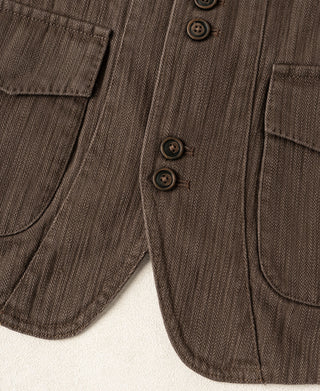 Brown herringbone waistcoat front with four buttons and side welt pockets