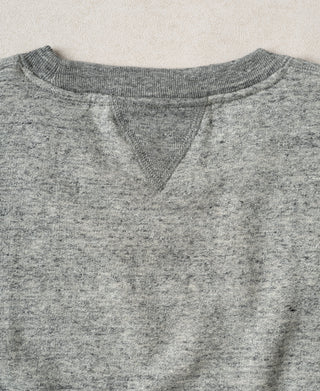 Heather gray crewneck sweatshirt with V-shaped yoke panel at center