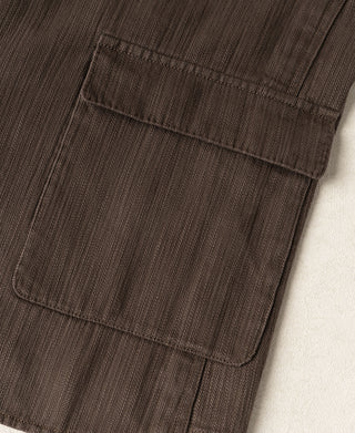 Brown herringbone blazer side pocket with flap and neat topstitching