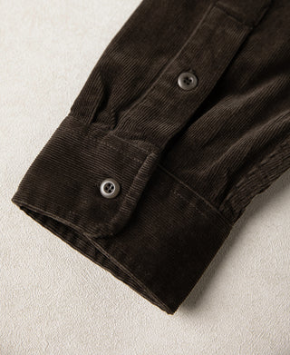 Brown corduroy work shirt sleeve cuff with button closure