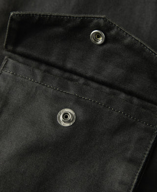 Black olive field jacket pocket flap with two snap buttons