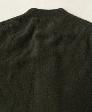 Olive knit cardigan back view with ribbed collar and shoulder seam